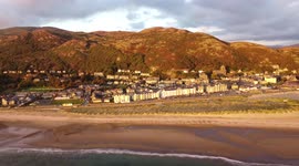 Aerial drone footage of Barmouth in Wales at sunset September 2021