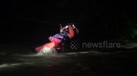 Seven teenage boys rescued from overflowing river with ropes, pulleys in Indonesia