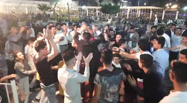 Groom Dancing with his friends In Open air wedding