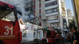 Fire trucks put out explosive apartment fire in Ukraine