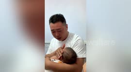 Chinese father cries when watching 3-month-old son getting injection