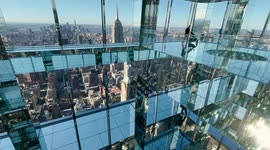 New York's new tourist attraction features dizzying glass-bottomed mirrored 1,000ft observation deck