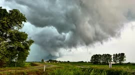 Amazing shelf cloud with increasing winds becoming stronger on a severe thunderstorm warned storm in italy. Storm chasing