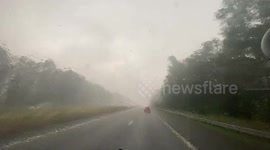 Driving through some extreme, wild straight line winds in a storm chase under a severe thunderstorm warned storm