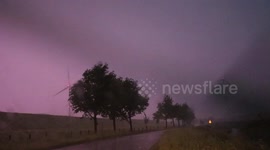 STORM CHASER UNDER CONSISTENT THUNDER & LIGHTNING IN HOLLAND