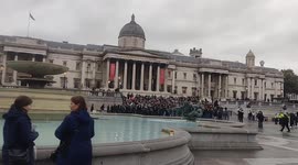 SK rapid wien fans singing and chanting in Trafalgar Square ahead of tonight's football match with West Ham united
