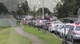 Motorists queue for hours for fuel amid the ongoing shortage crisis
