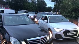 Queue-jumping Mercedes told to 'f*** off' before driving off amid nasty line at London petrol station