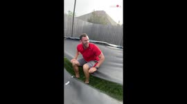 'Dada, stop!' Epic trampoline fail shows man crashing through the mat