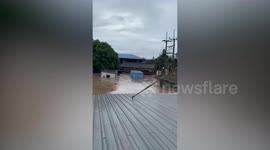Hospital flooded from tropical storm battering central Thailand