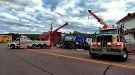 Massive garbage truck flips over in Pennsylvania