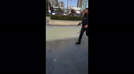 Armed police run towards Metrotown mall in Vancouver, Canada, to stop potential shooter. Incident was later declared 'unfounded'.