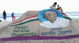 Beautiful sand sculpture of Mahatma Gandhi for his 152nd birth anniversary