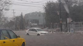 Car dragged away by water as heavy rains hit Guadalajara, Mexico