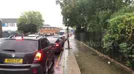 Long never-ending queue at London petrol station as drivers continue to suffer shortages amid panic buying crisis