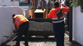 Cleanup of volcano eruption sand continues in Los Llanos as authorities lift stay-home order