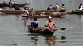 Government official organise Dal lake De weeding ahead of winter tourism in Northern India