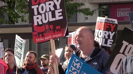 Hundreds of people take part in an anti-Tory party march in Manchester
