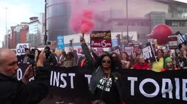 UK Conservative Party conference: Thousands protest in Manchester, lighting flares and chanting 'Tories out!'