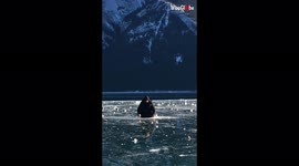 Musician entertains crowd with epic drum solo on frozen lake in Canada