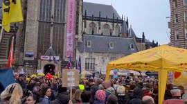 Netherlands: Thousands Protest Against COVID-19 Measures In Amsterdam 3
