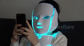 Bizarre flashing LED robot face mask from China