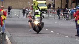 Women's Winner Charlotte Purdue Seen Running The London Virgin Marathon 2021