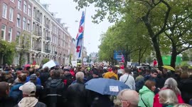 Netherlands: Thousands Protest Against COVID-19 Measures In Amsterdam 6