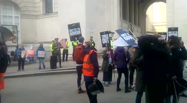Protesters demonstrate outside the Conservative Party Conference in Manchester, UK.