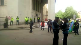 Small group of protesters lobby outside the Tory Party Conference in Manchester, UK