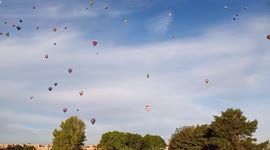 Hot air balloons loom over Albuquerque in the hundreds