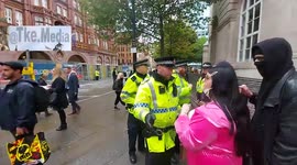 Activist Thrown To The Floor Following Argument With Police Over Where They Are Allowed To Protest. Outside The Conservative Party Conference