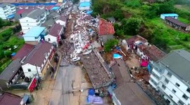 Residential buildings collapse as landslide caused by rainstorm hits China