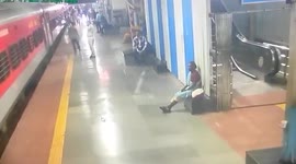 Woman passenger nearly falls beneath running train, gets rescued in western India