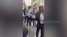 Squid Game fans in Paris recreate scene from Netflix show