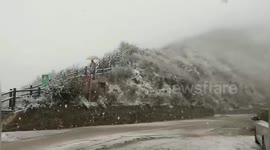 Beijing's first snow of the year covers mountaintops