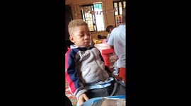 Toddler taking a nap during snacks time. Fallen asleep this soon is so laughable!