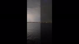 Slow motion footage shows the moment lightning strikes tore across the sky in San Diego