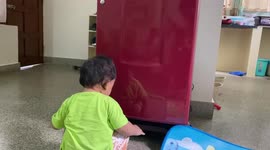 Baby Talking with own reflection and having fun