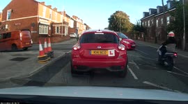 Motorcyclist slams into car then flees on foot as police officers approach in West Yorkshire, UK