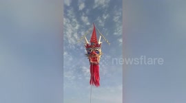 Man uses over 100 China flags to form huge kite to celebrate the country's national day