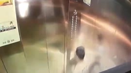 Chinese boy gets trapped in elevator after he urinates and causes fire
