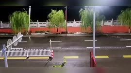 River embankment dramatically collapses due to heavy rainstorm in northern China