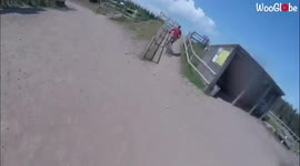 'BIG CRASH sends mountain biker over the handlebars '
