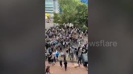 Newcastle fans celebrate outside St James' Park after Saudi takeover is confirmed