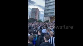 Newcastle United fans celebrate takeover deal