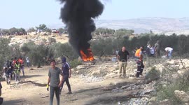 Palestinian protesters clash with Israeli forces after protest against settlements in the West Bank village of Beita