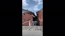 Celebrity scooter rider performs spectacular 'roof to roof' backflip