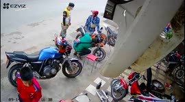 Motorbike catches fire while being repaired by mechanics