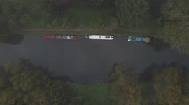 Drone shot of Barges on Lea Valley River on a Foggy Autumn Day